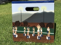 Cheerleaders on cheer boxes